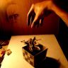 Человечек вылетает из куба или в него падает, хз
